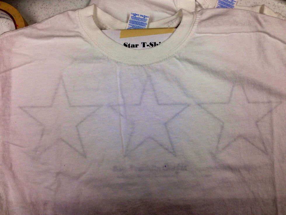 You should be able to see the star outlines through the front fabric.
