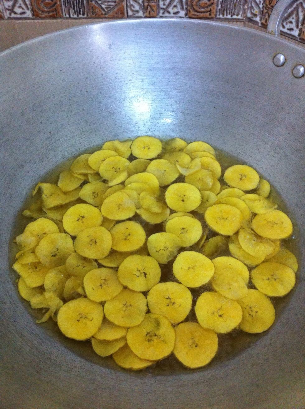 You should get these kind of chips after some few minutes. Now when you start moving these with a strainer you should hear nice crackling sound. That is when they are ready.