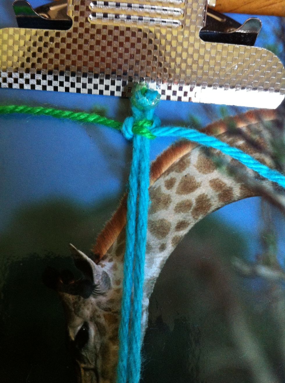 You should get this knot. (This is actually 2 knots. The first knot I did in the video.)