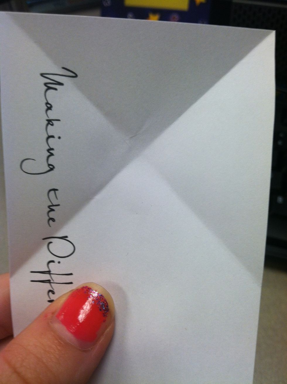 You should have an "x" creased in your paper.