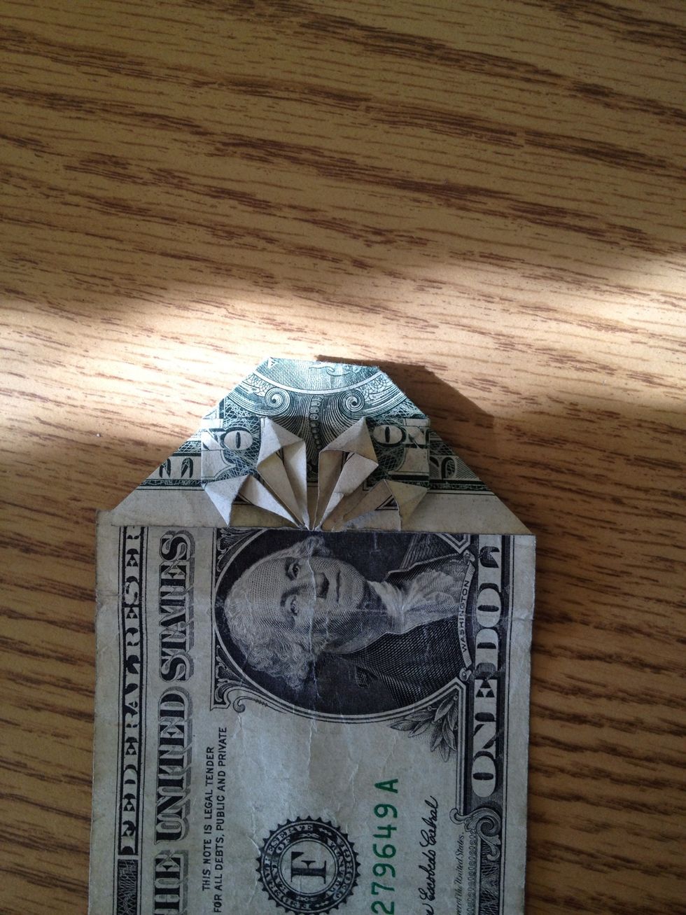 You should have something like this. And in the interest of time, repeat all steps for the other side of the dollar. You may proceed to the next step once you have done so.