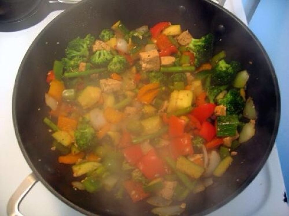 You should notice a few things. One, the broccoli should start to shrink together. The general rule of doneness still applies here, taste a few of the vegetables and see what you think.