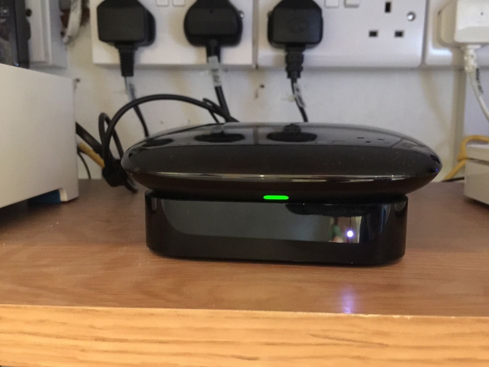 You should see the green light go out on the Harmony Base Station. Once this light goes out, wait 10 seconds and turn on the PortaPow again.
