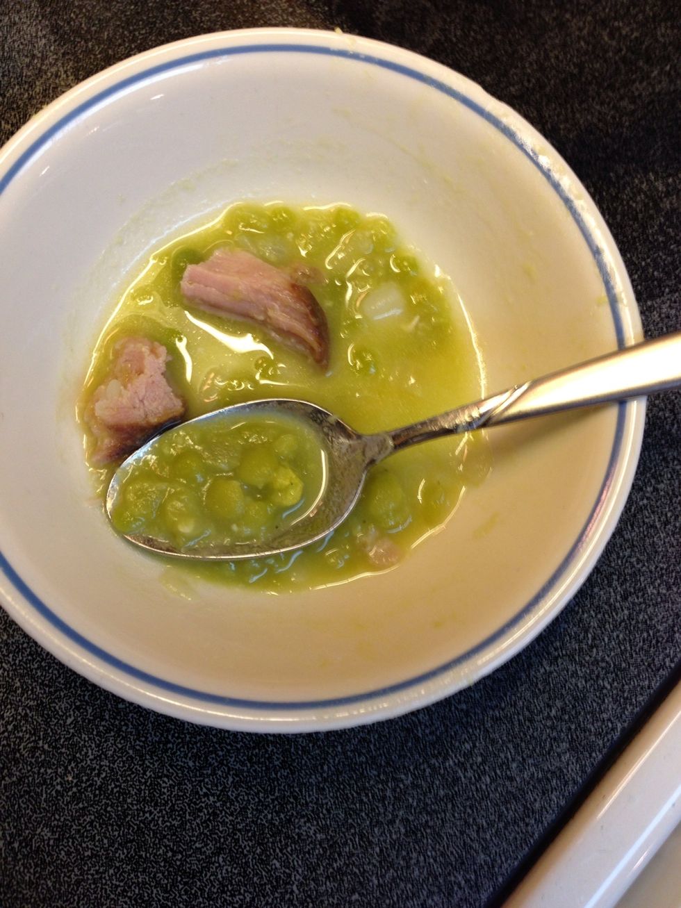 You should stop simmering while peas still have their shape. They will continue to soften and broth will thicken. Did I say you can't get too much ham!? Best way to test is tasting.