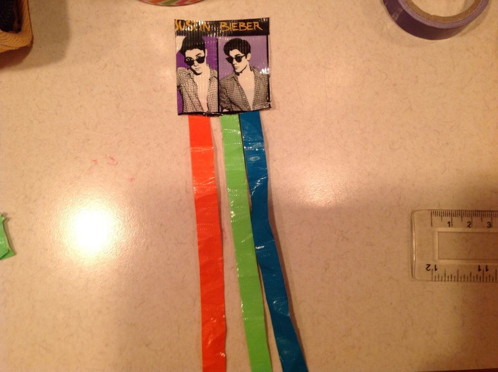 You slit the big tape into a half then you fold them on top. Then you put tape on top.