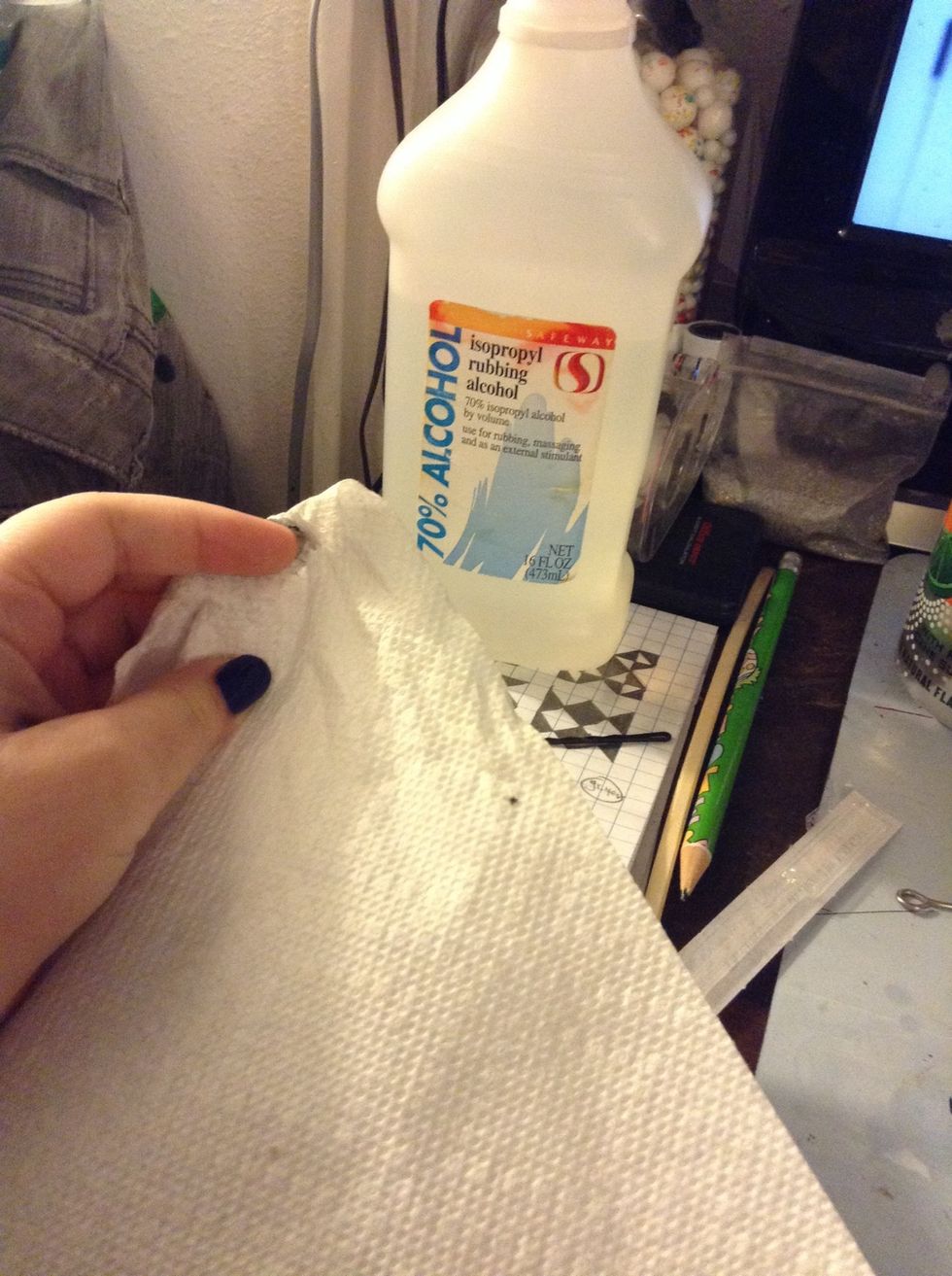 You sterilize the needle by soaking it in the alcohol. You can also use a lighter, but I dunno how. Use the rubbing alcohol to clean your skin where you want your tattoo (and also everything else).
