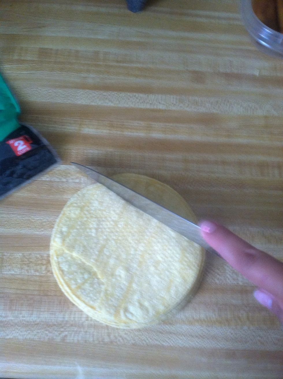 You the tortillas in squares or you can just pull them apart.