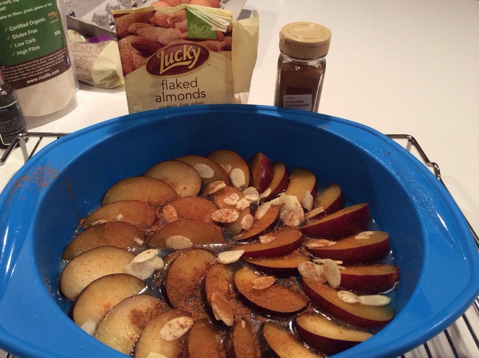 you then place the plums in the carmel to line the pan and you can also add some cinnamon and almond or some thing like that for some extra flavour.