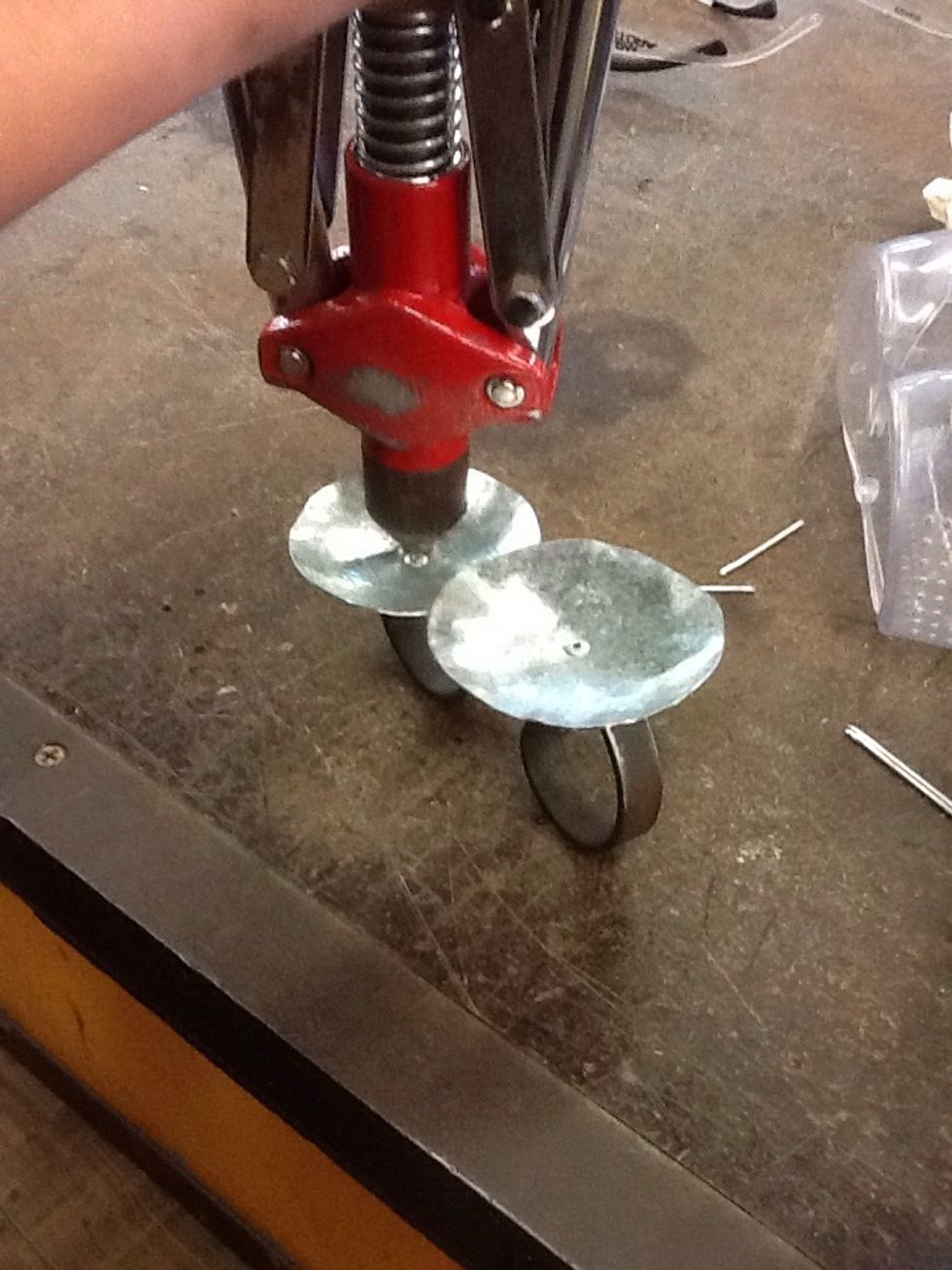 You then pop rivet your dishes onto your pieces and weld if needed