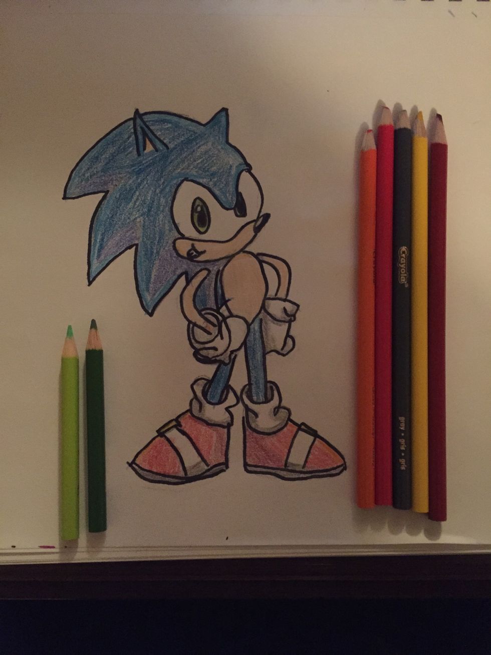 You use 2 greens for the eyes (dark green at top and light green at the bottom of the eye) you color the shoes dark red, red , and orange/yellow