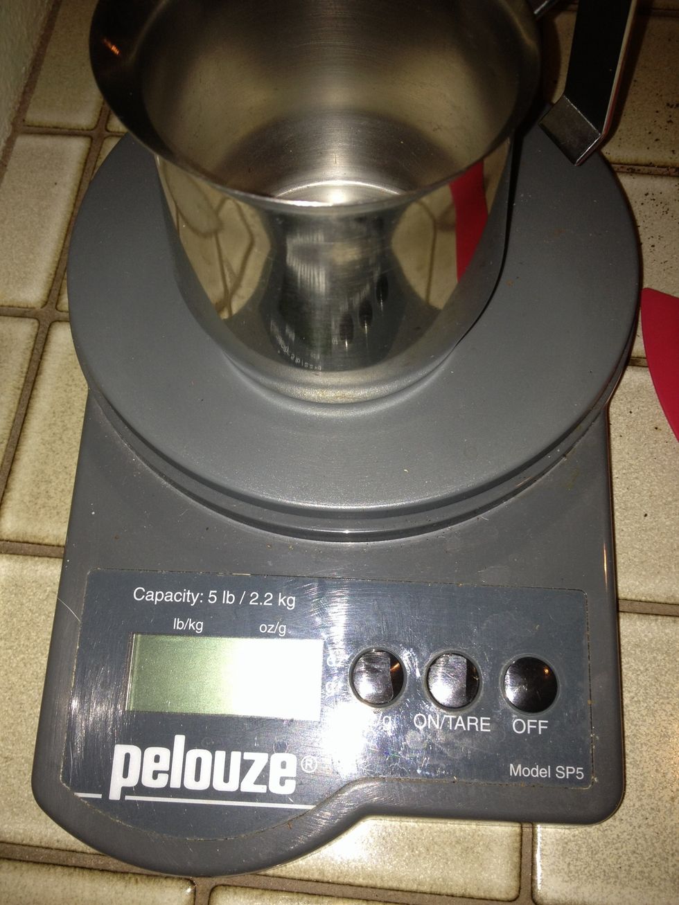 You want around 55 grams of coffee. It's best to fresh grind whole beans.