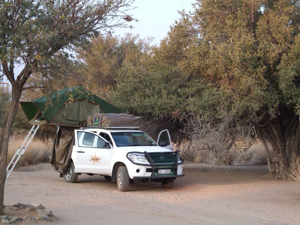 You want something like this. South Africans call it a Bakkie.