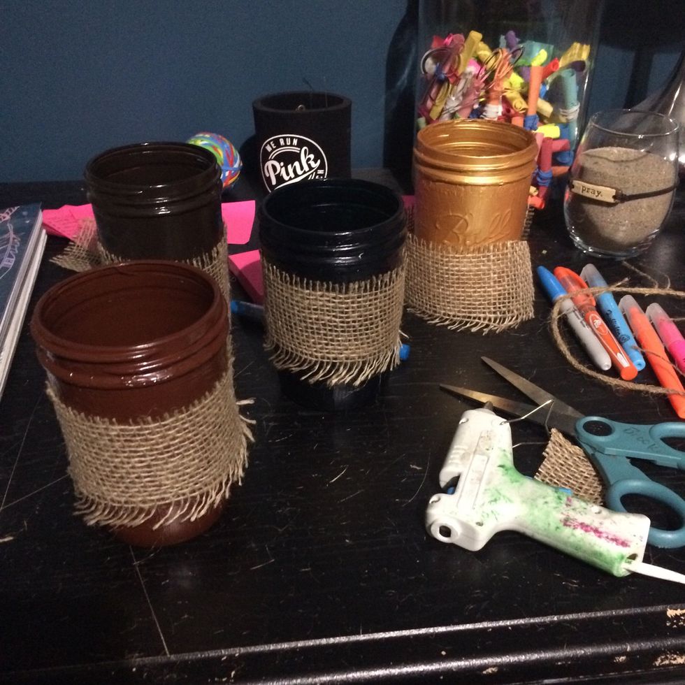 You want to hot glue the burlap together around the jar
