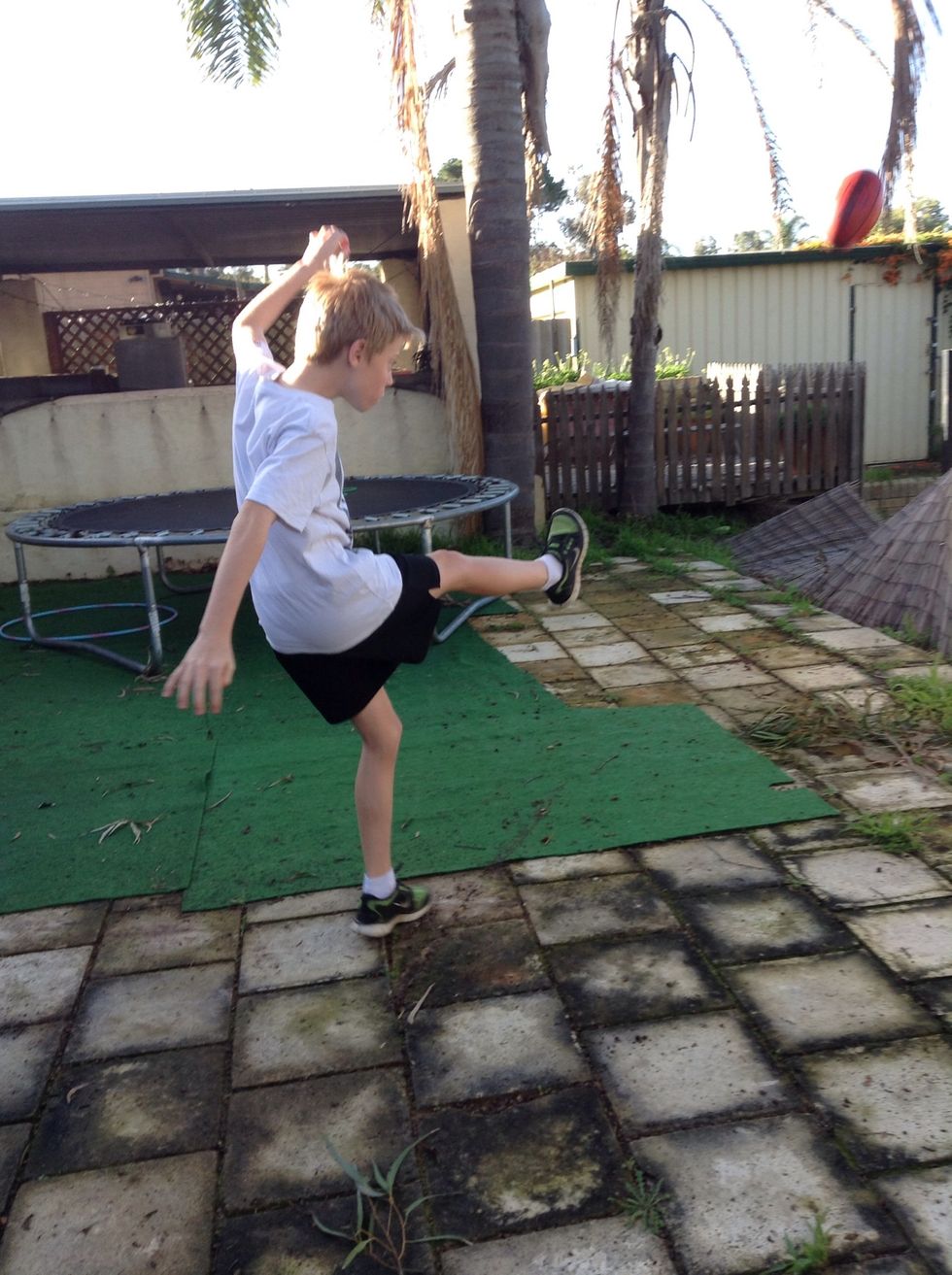 You want to lift your opposite arm up to leave the ball to drop smoothly.