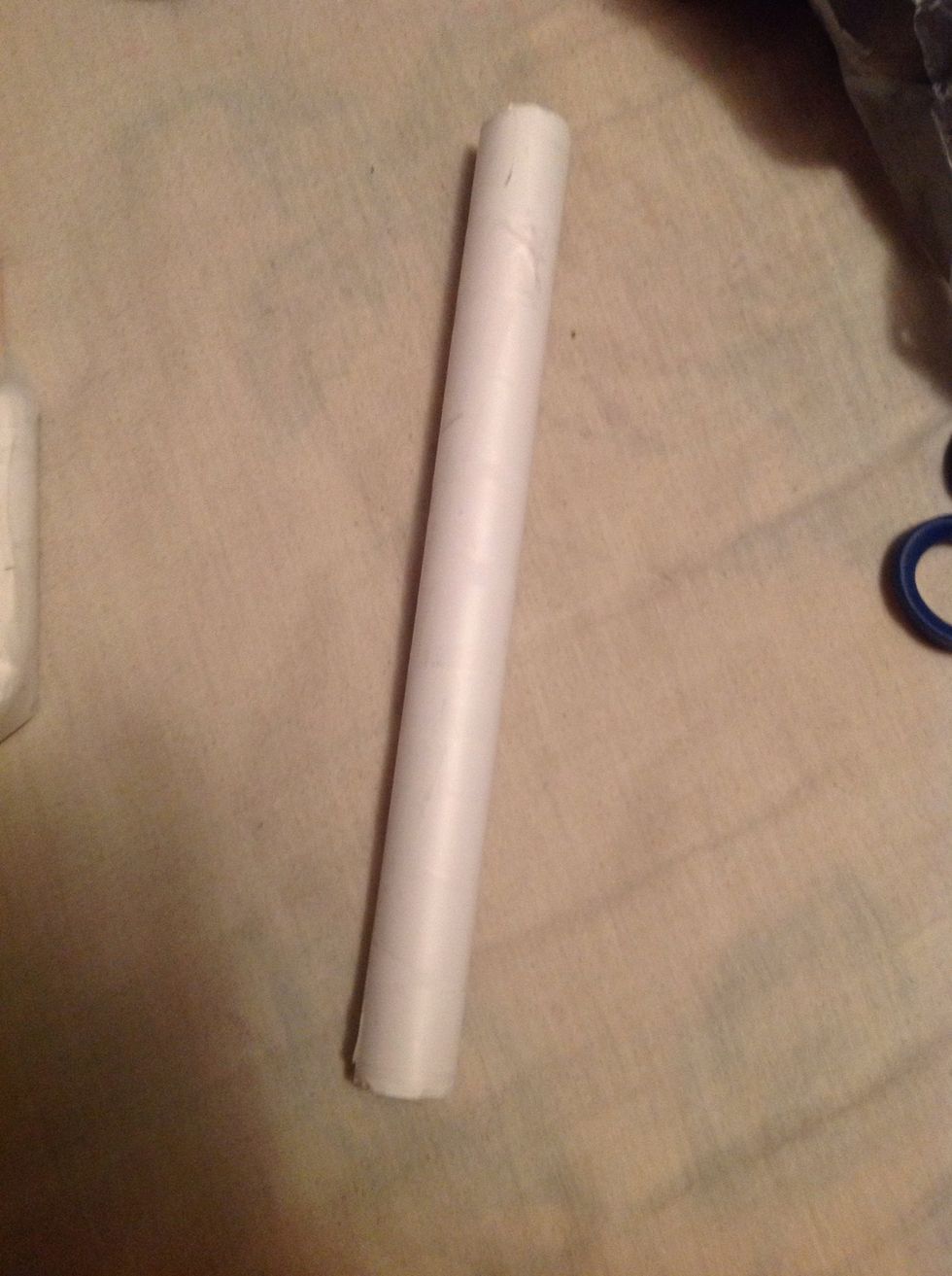 You want to roll the five sheets of paper with a pencil, then tape it together so it don't unroll.