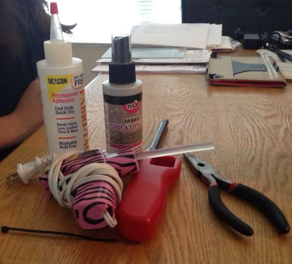 You will also need fabric tac glue, tulip fabric glitter spray, a hair tie, hot glue gun, a lighter, pliers, and a zip tie.