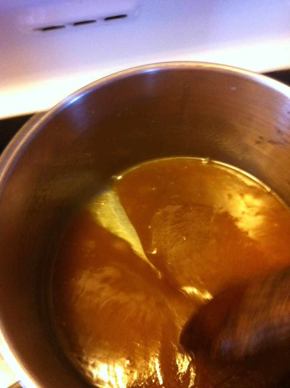 You will be able to draw wooden spoon through the mixture like this, stir a few extra times and pour over cracker mixture.