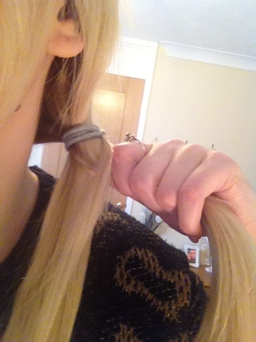 You will begin to see a X Forming. Please note I usually use both hands! - continue taking a small amount from the outside of one section and crossing it over to the other section\u2026