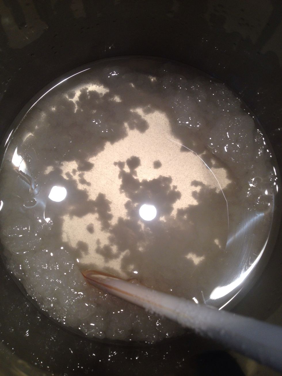 You will end up with a slightly flakey mixture. Put in the oatmeal and keep stirring.