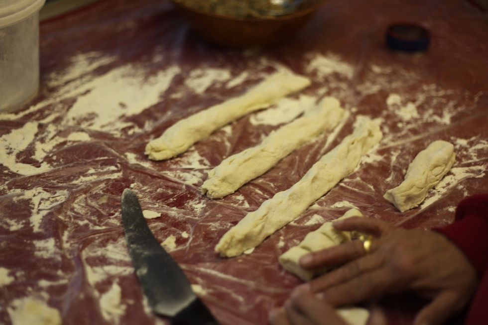 You will find that when your rolling the dough it will feel wet and a touch sticky. Well done!! Perfect dough do far. Use a plastic bag and flour to keep the flour from sticking. Roll into small logs