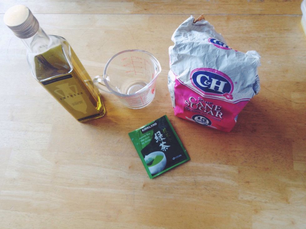 You will need 1/4 cup of water, 1/4 cup of sugar, 2 table spoons of olive oil, and 1 green tea bag. You can also use loose tea.