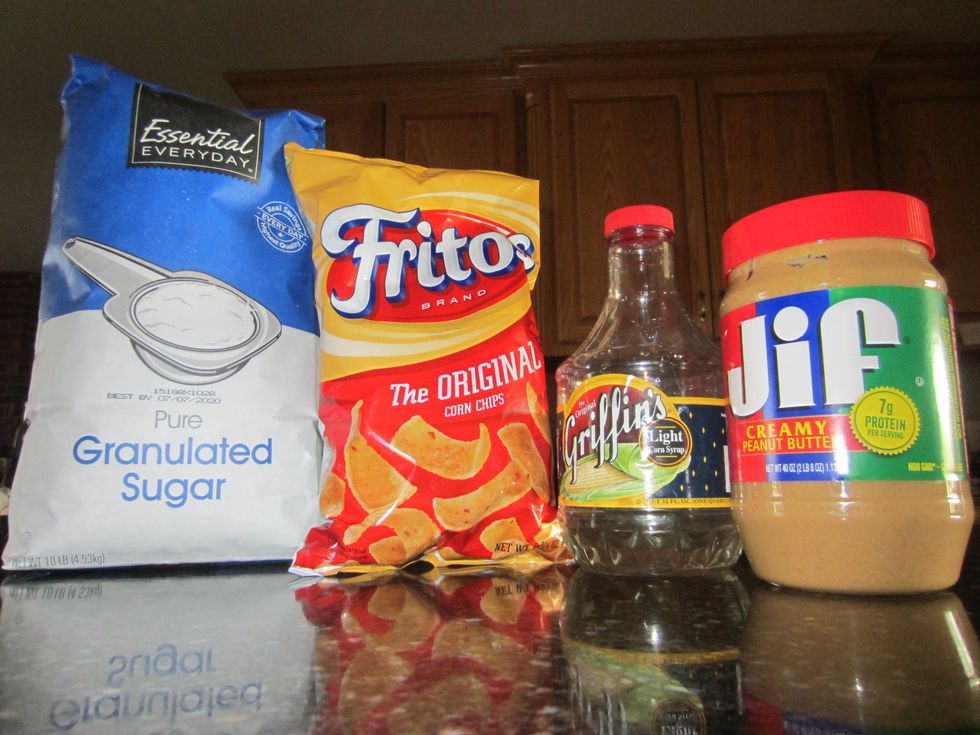 You will need: 1 cup of white sugar; a 10 oz bag of Fritos; 1 cup of white corn syrup; and 1 cup of peanut butter.