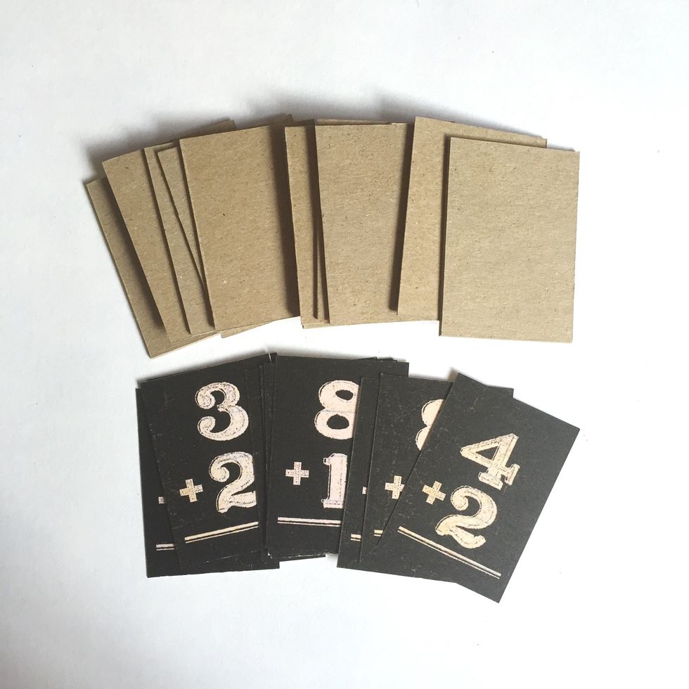 You will need 12 chipboards and 12 number placards as follows...