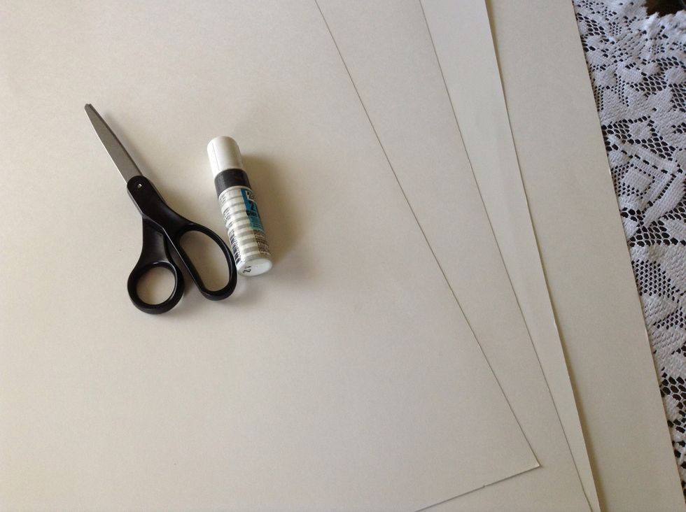 You will need: 4 - 22 inch X 28 inch poster boards, glue stick, and a pair of scissors