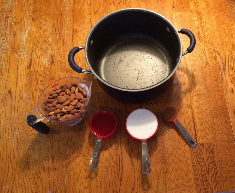 You will need:  -a large pot -two cups of almonds  -one cup of sugar  -half a cup of water -one tablespoon of cinnamon