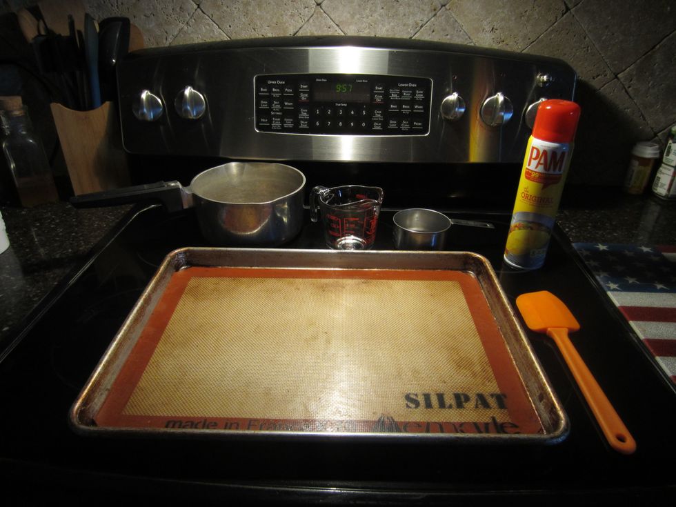 You will need a medium sized sauce pan, liquid measuring cup, dry measuring cup, rubber spatula, knife, and cookie sheet. Spray the cookie sheet with cooking spray or use a silicone baking sheet.
