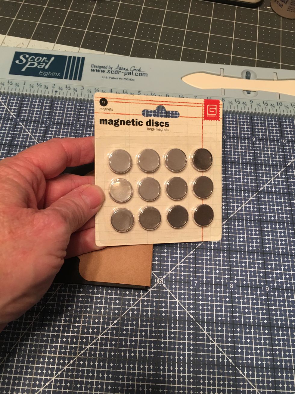 You will need a package of large magnetic discs for the outside closure of the album and for the flaps inside the album.