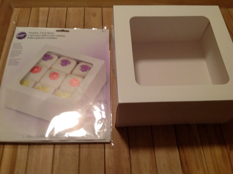 You will need a small or medium cake box with a clear see-through top..Sold in your local Michaels Crafts store. You can purchase a plain white one or a designed one of your choice...