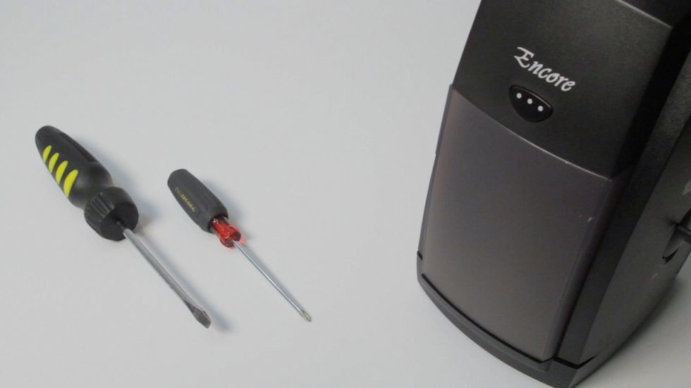 You will need a standard flat head srewdriver and a fine point Phillips head.