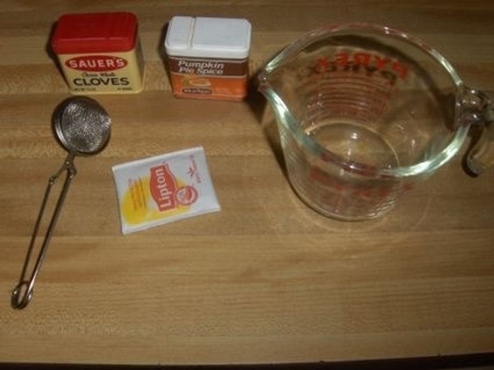 You will need a tea strainer for the cloves and something to heat and measure the water and creamer with