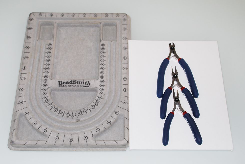 You will need a Tool Kit with Round Nose and Chain Nose Pliers, Cutters and a Design Board/Tray. You can purchase a tool kit in my shop: modnitsaatelier.com/shop