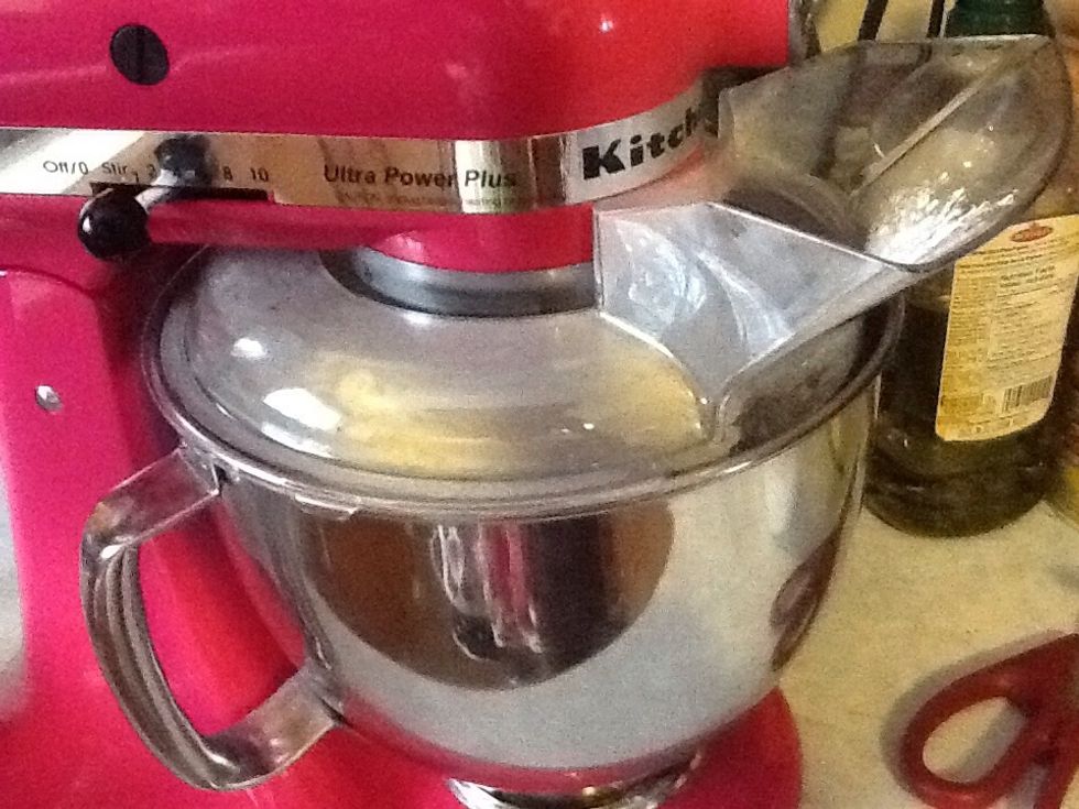 You will need an electric mixer of some kind for this next step. Slowly.....very slowly as in 5-10 minutes add the powdered sugar by spoonfuls. It seems unnecessary but it really does make this fudge!