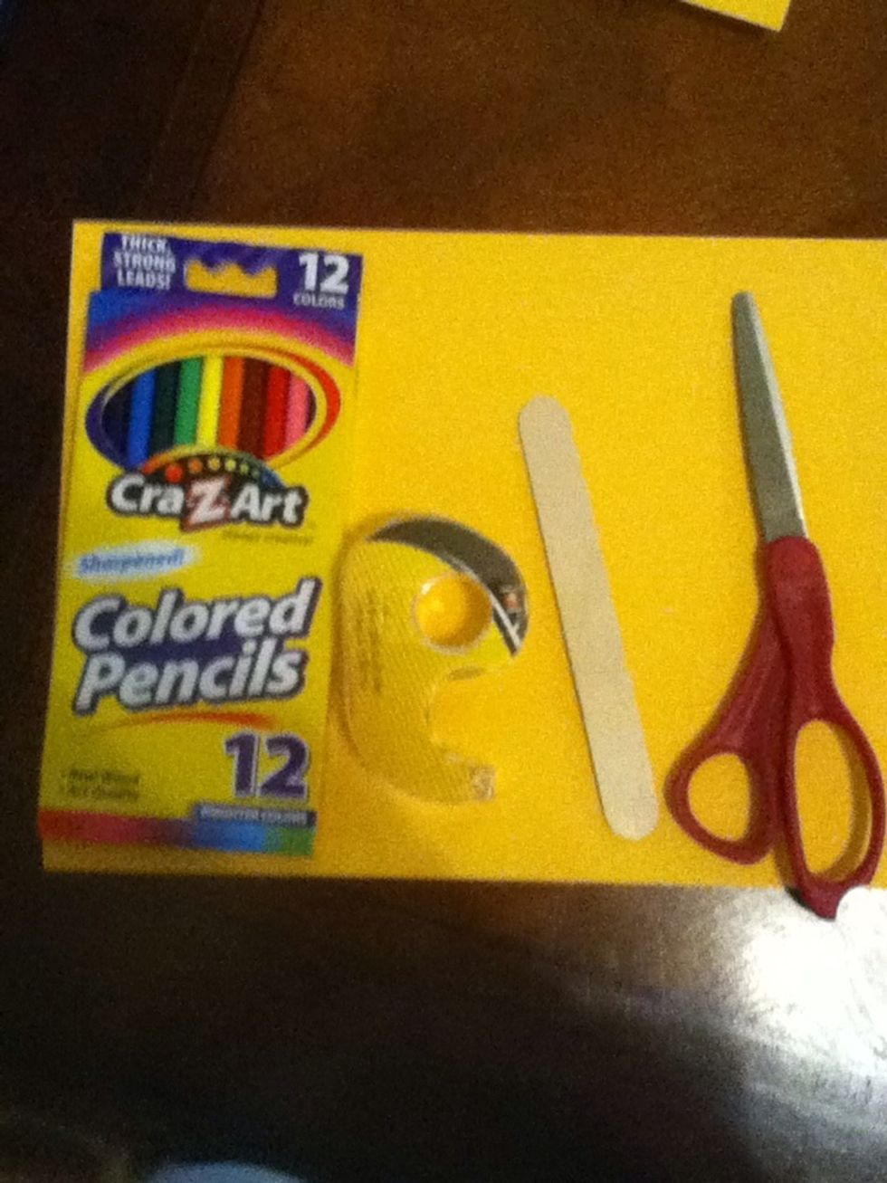 You will need colored pencils, any color card stock paper, scissors, Popsicle sticks, and tape (double sided)