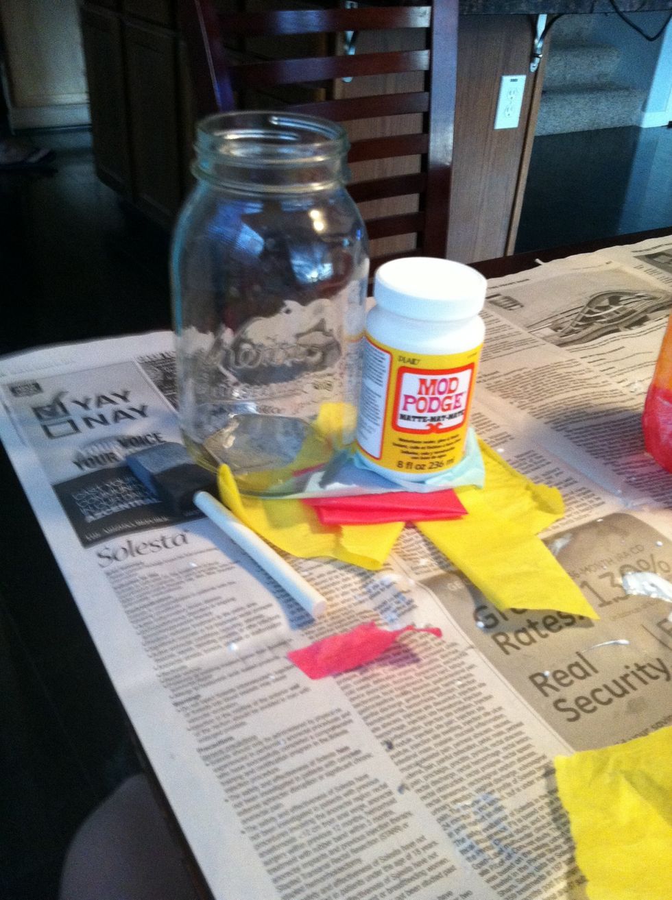 You will need: Glass Jars, Tissue Paper, Sponge Paint Brushes, and Matte or Shiny Modge Pogde. You might also want to cover the area with scrap or newspaper to prevent messes.