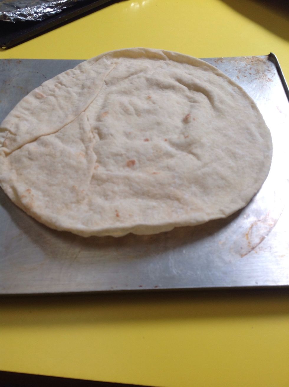 You will need mission pizza wraps.  First put the pizza wrap on a tray