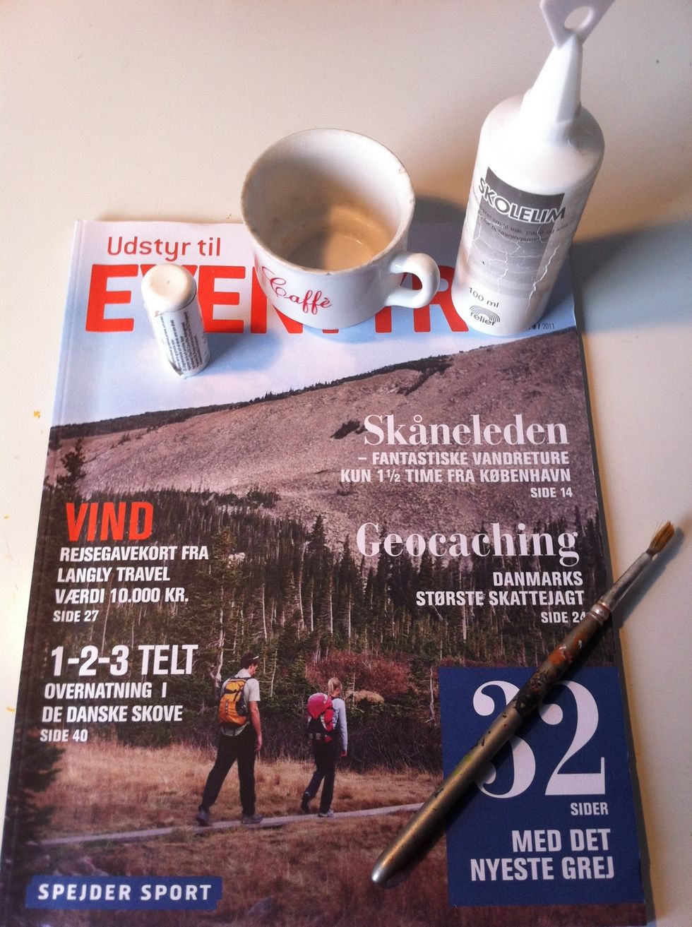 You will need some glue, a magazine, a little bowl, one very small round thing (1 cm) and a brush.