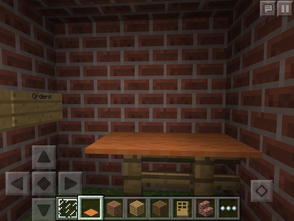 You will need somewhere to make the food, so make a table by clicking on the fence and a carpet and putting the fence down and then the carpet on top.