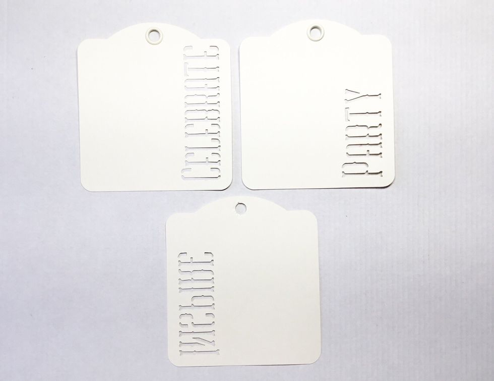You will need three tags, these can be any size. I chose to use Graphic 45 Ivory Square Tags.