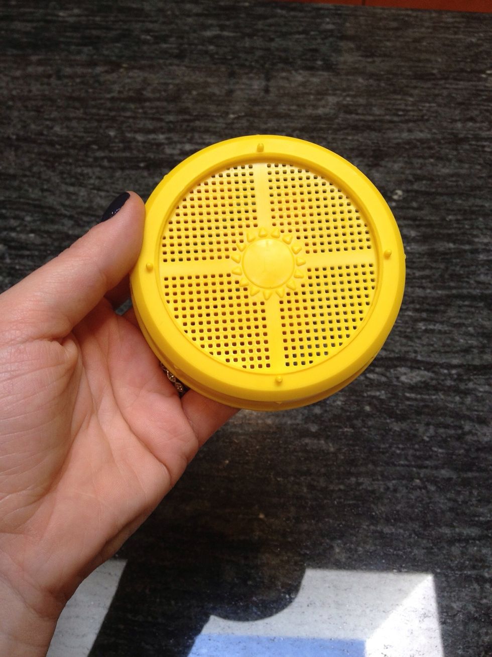 You will need to cover the jar with something that holds the seeds when you rinse. You can purchase a plastic cap that fits on a standard quart sized mason jar (shown here) for about $5.