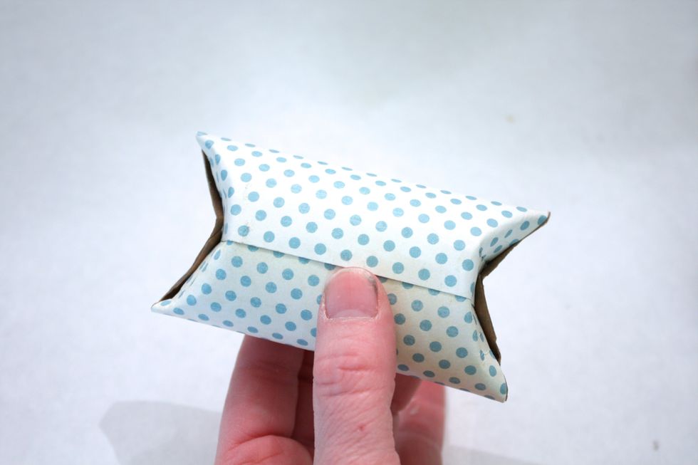 You will notice that one side overlaps- make sure they overlap shows to the back where the seam is, as shown