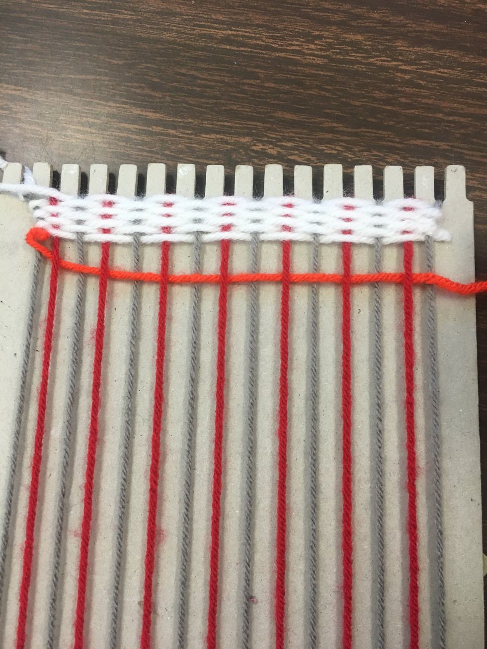 You will notice the same things happen with string number 2 as did with number 1, you will have to push your yarn to the top & carefully wrap each end so not to change the shape of the weave.
