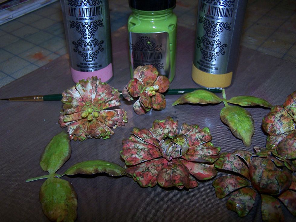 You will now paint your flowers using a small paint brush and Colorations Salmon and Timeless and Velvet Limeaid.  An optional step is to add Diamond Dust to your flowers.