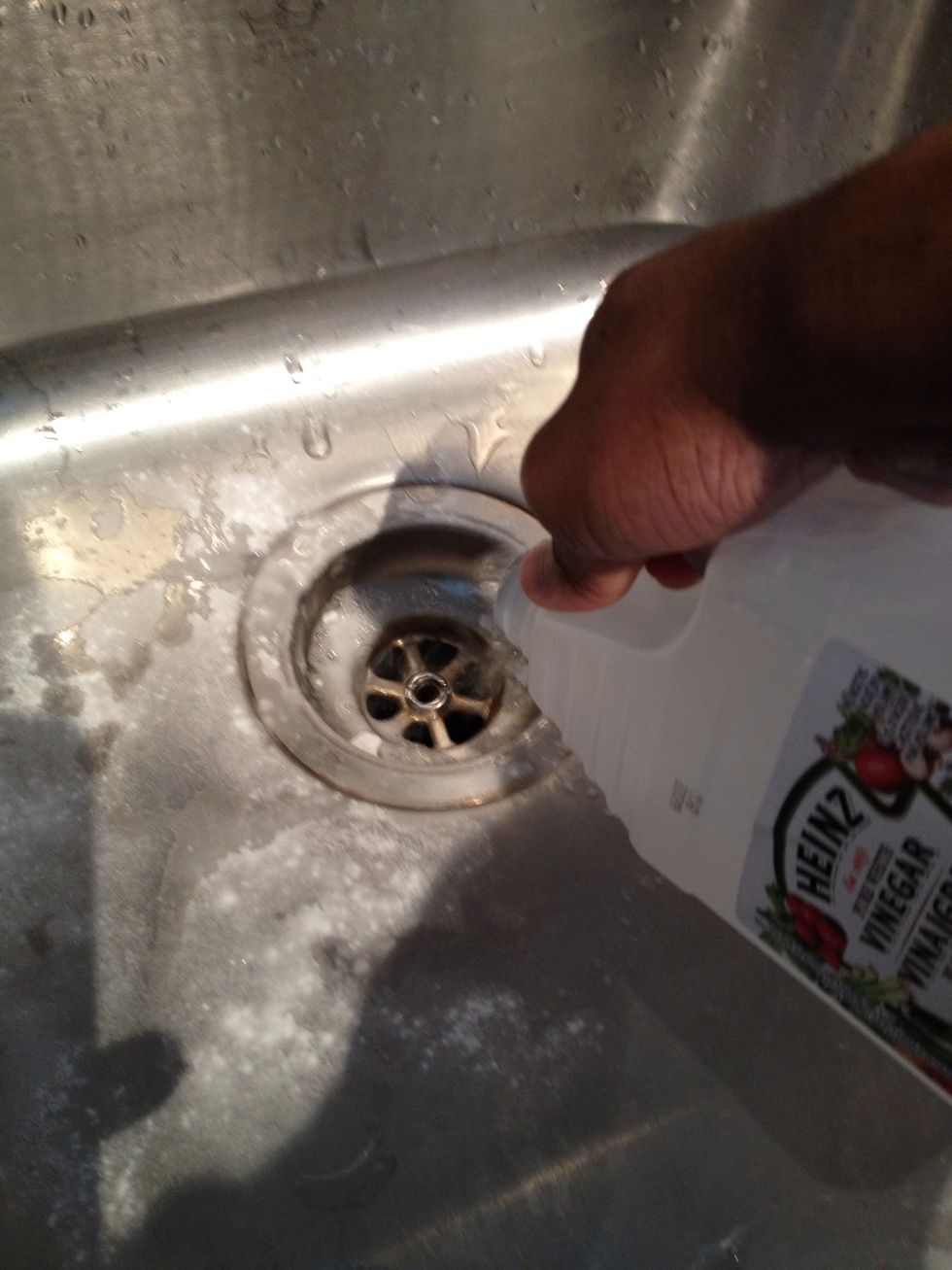 You will start hearing the vinegar fizzing with the baking soda.