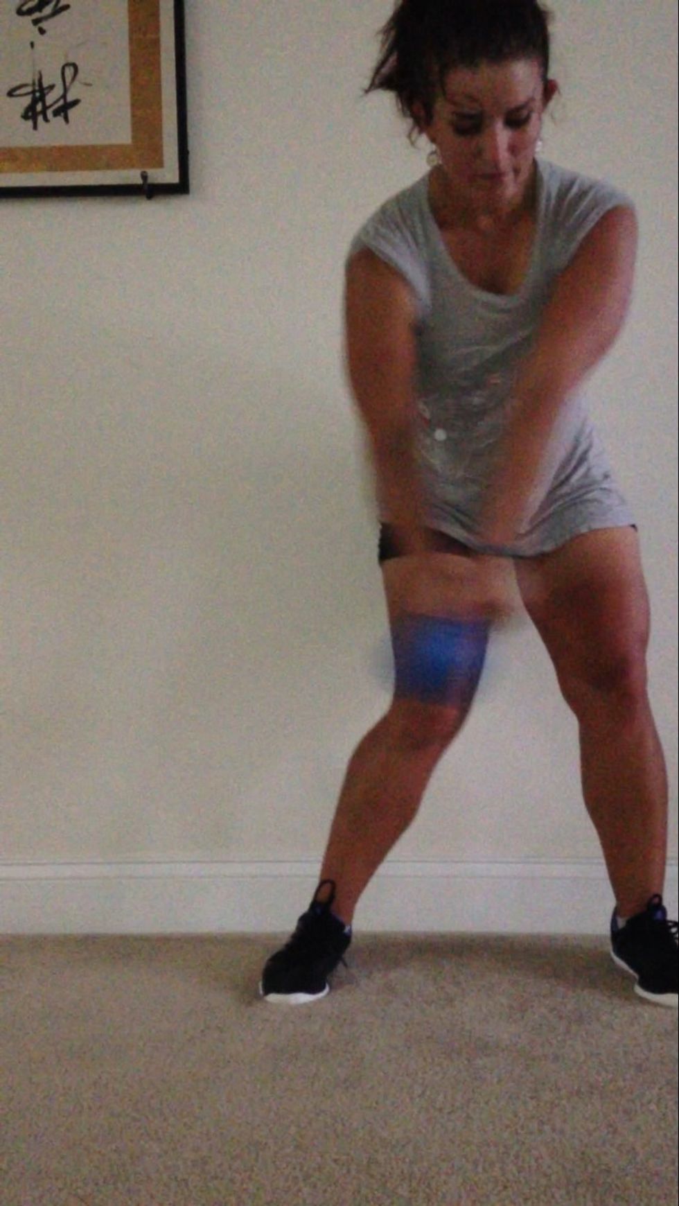 You will swing just past the halfway point, driving your knee towards the other side