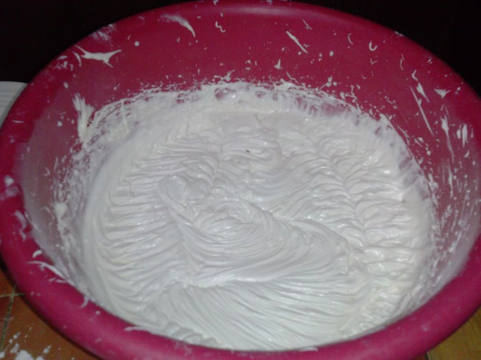 You will then add the heavy whipping cream and beat until it gets thick enough to spread. Add more sugar or cream if needed.