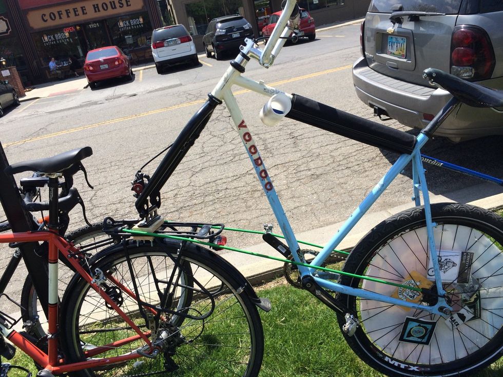 You will then remove the front wheel of the bike you're trailing and be sure to make sure the mount is tightened down snug.